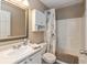 Cozy bathroom with a single sink, white cabinets, and a tub-shower combo at 1450 Millridge Dr, Greenwood, IN 46143