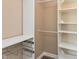 Spacious closet with shelving and drawers for optimal storage and organization at 1450 Millridge Dr, Greenwood, IN 46143