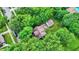 An aerial perspective of a charming home nestled among lush, mature trees and greenery at 1511 E Edwards Ave, Indianapolis, IN 46227