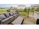 Inviting wooden deck with comfortable outdoor seating and views of the backyard at 15598 Memorial Way, Fishers, IN 46037