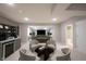 Entertainment-ready basement with bar, seating, and recreation area at 1590 Birchfield Dr, Westfield, IN 46074