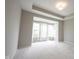 Spacious bedroom featuring a tray ceiling, neutral walls, and bright natural light from multiple windows at 1590 Birchfield Dr, Westfield, IN 46074