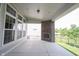 Open covered patio featuring a brick fireplace and plenty of room for patio furniture and outdoor enjoyment at 1590 Birchfield Dr, Westfield, IN 46074