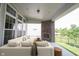 Relax on the covered patio with an outdoor fireplace and plenty of space for seating and entertaining at 1590 Birchfield Dr, Westfield, IN 46074