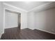 A versatile room with hardwood floors, neutral walls, and crown moulding at 1590 Birchfield Dr, Westfield, IN 46074