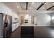 Bright kitchen featuring stainless appliances, subway tile backsplash, and a central island at 1590 Birchfield Dr, Westfield, IN 46074