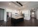 Modern kitchen with a central island, stainless steel appliances, and ample cabinet space at 1590 Birchfield Dr, Westfield, IN 46074