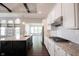 Bright kitchen with granite countertops, stainless steel appliances, and a center island at 1590 Birchfield Dr, Westfield, IN 46074