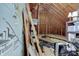 Spacious unfinished attic provides ample storage or potential for future renovation at 214 W Stoney Trl, Greenfield, IN 46140