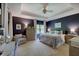 Navy bedroom with tray ceiling, carpet, and lots of natural light at 214 W Stoney Trl, Greenfield, IN 46140