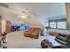 Bonus room with carpet, vaulted ceilings, sitting area, and natural light at 214 W Stoney Trl, Greenfield, IN 46140
