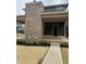 Outdoor deck area with brick fireplace at 2148 N Pennsylvania St, Indianapolis, IN 46202