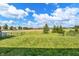 Fenced backyard offering ample space and a view of the neighborhood, creating a safe and open outdoor area at 2211 Willowview Dr, Indianapolis, IN 46239