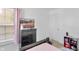 Well lit bedroom featuring a television, carpeted floors, and a closet at 2211 Willowview Dr, Indianapolis, IN 46239