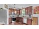 Well-equipped kitchen with stainless steel appliances, granite countertops, and ample cabinetry at 2211 Willowview Dr, Indianapolis, IN 46239