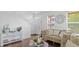 Cozy living room with hardwood floors, neutral tones, and ample natural light at 2211 Willowview Dr, Indianapolis, IN 46239