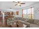 Spacious living room with an open kitchen and cozy seating area at 2211 Willowview Dr, Indianapolis, IN 46239