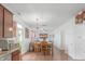 Open floor plan integrating dining and living areas for seamless entertaining at 2211 Willowview Dr, Indianapolis, IN 46239