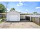 Exterior view of a detached garage with an open carport area at 2309 Maple St, Columbus, IN 47201