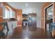 Charming eat-in kitchen with stainless steel appliances and updated cabinets at 2309 Maple St, Columbus, IN 47201