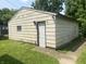 The rear of the garage, a door and a window at 24 Hendricks Pl, Indianapolis, IN 46201