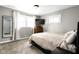 Cozy bedroom featuring neutral walls, carpet flooring, and natural lighting at 258 N Green Springs Rd, Indianapolis, IN 46214