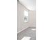 Neutral bedroom with plush carpeting, window, and an electrical outlet at 2892 Maricopa Blvd, Whitestown, IN 46075
