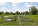 Backyard vegetable garden with raised beds and lush green grass at 2892 Maricopa Blvd, Whitestown, IN 46075