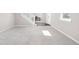 Spacious, carpeted living room featuring neutral walls and ample natural light at 2892 Maricopa Blvd, Whitestown, IN 46075