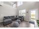 Inviting living room features tall ceilings, abundant natural light, and modern furnishings at 2892 Maricopa Blvd, Whitestown, IN 46075