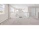 Bright loft area with windows and white railing, offering versatile space for relaxation or recreation at 2892 Maricopa Blvd, Whitestown, IN 46075