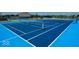 Bright blue tennis courts offer a great recreational amenity within the Trailside community at 2892 Maricopa Blvd, Whitestown, IN 46075