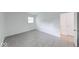 Bedroom with tile flooring and a window for natural light at 3817 Strathmore Dr, Indianapolis, IN 46235