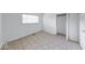 Bedroom with tile flooring, window, and closet at 3817 Strathmore Dr, Indianapolis, IN 46235