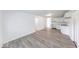 Spacious open-concept kitchen, with updated white cabinets, flows seamlessly into the living area at 3817 Strathmore Dr, Indianapolis, IN 46235
