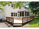 Spacious back deck with built in bench seating overlooks the lush backyard at 3823 Vanguard Cir, Carmel, IN 46032