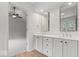 Bathroom features double vanity, modern fixtures, and a view into bedroom at 3823 Vanguard Cir, Carmel, IN 46032