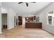 Open floor plan showcases hardwood floors, and a kitchen with bar-style seating at 3823 Vanguard Cir, Carmel, IN 46032