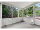 Screened in porch with view of outdoor pool at 3823 Vanguard Cir, Carmel, IN 46032