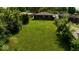 This is an aerial view of the backyard of this property which features a large grassy lawn at 3922 N Irvington Ave, Indianapolis, IN 46226