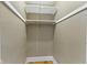 Small closet with white painted trim at 4002 Guilford Ave, Indianapolis, IN 46205