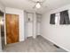 A bright bedroom features dual closets and a window with black-out drapes at 4020 Alden Ave, Indianapolis, IN 46221