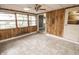 View of dining room with large windows and ceramic tile flooring at 4020 Alden Ave, Indianapolis, IN 46221