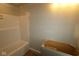 Bathroom with under-mounted vanity sink and full bathtub with tile surround at 4151 Barrel Ln, Westfield, IN 46062