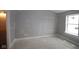 Sunlit bedroom with hardwood floors and neutral walls under construction at 4151 Barrel Ln, Westfield, IN 46062