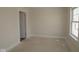 Bright, unfinished bedroom featuring white walls and natural light from the new windows at 4161 Barrel Ln, Westfield, IN 46062