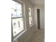 Bright bedroom featuring large windows offering natural light, enhancing the room's open and airy feel at 4161 Barrel Ln, Westfield, IN 46062