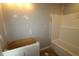 Unfinished bathroom featuring a new tub and awaiting a sink at 4171 Barrel Ln, Westfield, IN 46062