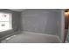 Unfinished bedroom boasts a large window providing ample natural light at 4171 Barrel Ln, Westfield, IN 46062