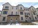 New townhome exterior featuring white paint and black trim at 4171 Barrel Ln, Westfield, IN 46062
